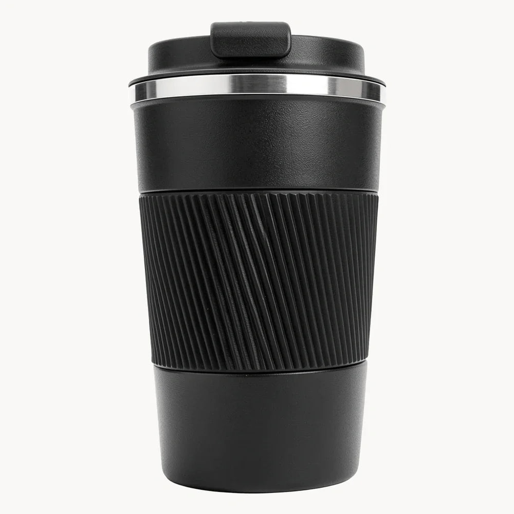 Black travel coffee mug with ribbed grip and lid, ideal for on-the-go use