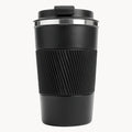 Black travel coffee mug with ribbed grip and lid, ideal for on-the-go use